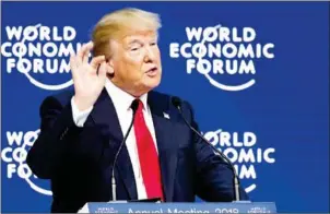  ?? FABRICE COFFRINI/AFP ?? US President Donald Trump delivers a speech during the World Economic Forum annual meeting on Friday in Davos, eastern Switzerlan­d.