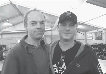  ?? For the Calgary Herald ?? Actor Hugo Weaving, left, with Cochrane’s Steven McMichael, the weapon-master for the new Hobbit trilogy.