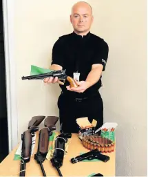  ??  ?? Off the streets Chief Inspector Simon Wright with weapons handed in during the recent gun amnesty