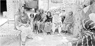  ??  ?? Noor (left) convinces to local village women to use their vote in the upcoming general election in Mohri Pur village, where women had previously been banned from voting. — AFP photo