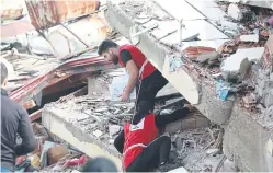  ?? ?? Red Cross workers assisting in the recovery effort in Turkey