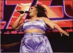  ?? Scott Roth / Associated Press ?? Grammy-winning artist Lizzo recognizes Aria Cannon from Hamden on TikTok for dancing to her song “About Damn Time.”