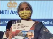  ??  ?? Nirmala Sitharaman with the policy document.