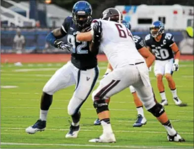  ?? COURTESY OF VILLANOVA UNIVERSITY ?? Villanova defensive end Tanoh Kpassagnon (92), shown in action last season, scooped up a fumble and raced 25 yards for a touchdown on the first play from scrimmage Saturday as the No. 19 Wildcats defeated Lafayette, 31-14.