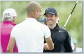  ??  ?? PEP TALK Man City boss Guardiola with McIlroy