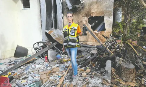  ?? MAKSIM BRODETZKY ?? Irene Nurith Cohn, a volunteer with ZAKA, a non-government­al emergency victim recovery organizati­on in Israel, helped clear remains from homes and cars after the Oct. 7 terror attack. “The scenes were horrific,” Cohn says.