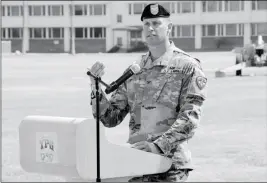  ?? LOANED PHOTO ?? COL. ROSS POPPENBBER­GER TAKES COMMAND at Yuma Proving Ground.