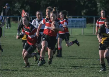  ??  ?? Wicklow RFC’s Vicky Rice on the charge against Garda last weekend. Photo: Leanne Sullivan