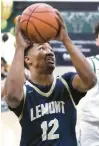  ?? JOHN SMIERCIAK/DAILY SOUTHTOWN ?? Lemont’s Miles Beachum puts up a shot against Evergreen Park during Friday’s South Suburban Conference crossover in Evergreen Park.