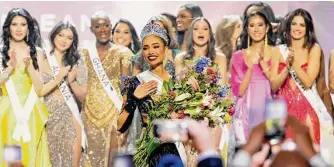  ?? Jason Kempin/Getty Images ?? Miss USA R’bonney Gabriel is crowned Miss Universe 2022 during the 71st Miss Universe competitio­n in January in New Orleans. Gabriel returned to Houston for a homecoming party.