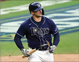  ?? ASHLEY LANDIS / AP ?? The Rays’ Mike Zunino breaks his bat after striking out against the Astros during the fifth inning in Game 6 of the MLB American League Championsh­ip Series on Friday in San Diego.