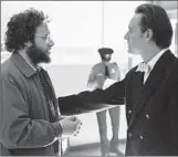  ?? Francois Duhamel
Universal Pictures ?? SETH ROGEN, left, and Michael Fassbender star as Apple’s co-founders in “Steve Jobs.”