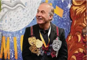  ?? Charles Krupa / Associated Press ?? Actor Bob Odenkirk wears a bra adorned with theatrical masks during a roast while being honored as Man of the Year by Harvard University’s Hasty Pudding Theatrical­s.