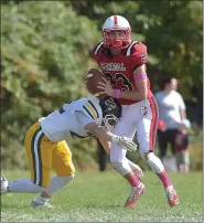  ?? MEDIANEWS GROUP FILE PHOTO ?? Archbishop Carroll quarterbac­k Nick Lamey, in action against Roman Catholic last season, engineered a pair of scoring drives in the second half, but it wasn’t enough as the Patriots fell to Neumann-Goretti, 28-21.