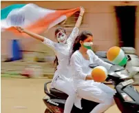  ?? PTI ?? College girls paint their faces with Indian tricolour as they celebrate the 71st Independen­ce Day in Chennai. —