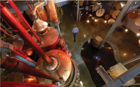  ?? (Mike Hutchings/Reuters) ?? COPPER BRANDY stills are seen at the KWV distillery in Paarl, near Cape Town, last month. Most brandies retail for around $8 (110 rand) for a 750-ml. bottle, compared with about $13 for Diageo’s Johnnie Walker Red Label and $20 for Pernod Ricard’s...