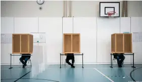 ?? Image : Ste  Loos/Getty Images ?? Un bureau de vote à Berlin lors des élections législativ­es en 2021