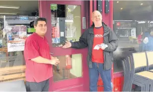  ??  ?? Rick Morris (left), from participat­ing business All Things Nice and Chris Wallis, chair of the Marple Refill Scheme, at its launch