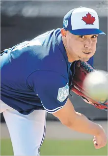  ?? NATHAN DENETTE THE CANADIAN PRESS ?? Toronto Blue Jays pitcher Aaron Sanchez throws a bullpen session Friday. He had finger issues for awhile, then surgery last September.