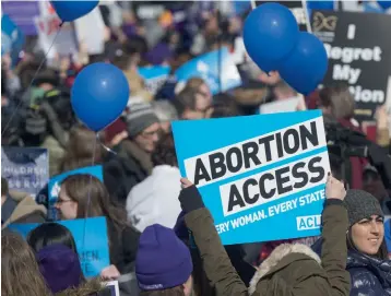  ?? — AFP ?? A file photo of supporters of legal access to abortion, as well as anti- abortion activists, as they rally outside the Supreme Court in Washington, DC.