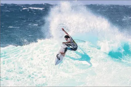  ?? PICTURE: WSL/THURTELL ?? DOMINANT: Michael February in action during the Buffalo City Surf Pro at Nahoon Reef in East London.