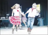  ?? FILE PHOTO ?? Kinley Ault and her square dance partner, Gunnar Orona, with Bows & Britches, perform during the exhibition dances at the 2018 Clotheslin­e Fair. This year’s Clotheslin­e Fair will have 60 exhibition groups and 15 competitio­n groups.