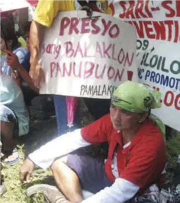  ?? ?? In this undated photo, Ilonggo activist Reynaldo “Jory” Porquia joins a protest against the rising prices of basic goods in Iloilo City.