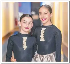  ??  ?? Charlotte White, 11, and Emma Blake, 13, were among the smiling performers at the Gold Coast Arts Centre.