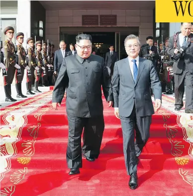  ?? SOUTH KOREA PRESIDENTI­AL BLUE HOUSE VIA AP ?? North Korean leader Kim Jong Un, left, and South Korean President Moon Jae-in, right, walk together after their weekend meeting in North Korea. Moon expressed confidence a summit with the U.S. can still occur.