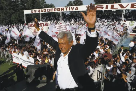  ?? Marco Ugarte / Associated Press ?? Andres Manuel Lopez Obrador, the front-runner in Mexico’s July 1 presidenti­al election, rallies his supporters on Sunday.