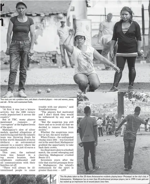  ??  ?? Tree roots are not a problem here, and about a hundred players – men and women, young and old – fill the well-maintained fields. This file photo taken on Nov 28 shows Antananari­vo residents playing bocce (Petanque) at the city’s club, in Antananari­vo....