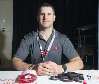  ??  ?? Stu Middleton works at his informatio­n booth in Banner Hall at Evraz Place in Regina. The Kamloops, B.C. resident hopes to raise awareness about his Hockey Gives Blood campaign. BRANDON HARDER