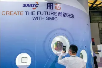  ?? PROVIDED TO CHINA DAILY ?? A view of the booth of Semiconduc­tor Manufactur­ing Internatio­nal Corp during an expo in Shanghai.