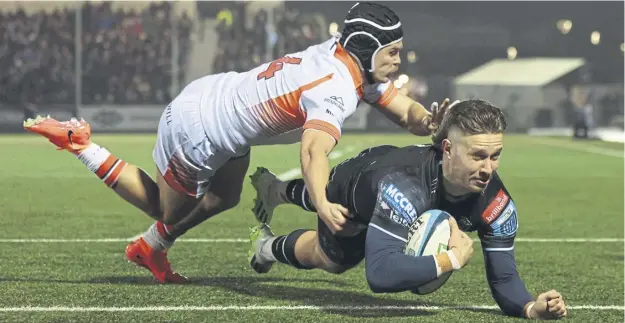  ?? ?? Kyle Rowe, pictured scoring a try against Edinburgh at Scotstoun last month, has made a strong start to the season with Glasgow and is eager to add to his one Scotland cap