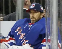  ?? JIM MCISAAC - THE ASSOCIATED PRESS ?? FILE - Then-New York Rangers goaltender Henrik Lundqvist looks on from the bench during an NHL hockey game against the Buffalo Sabres in New York, in this Friday, Feb. 7, 2020, file photo.