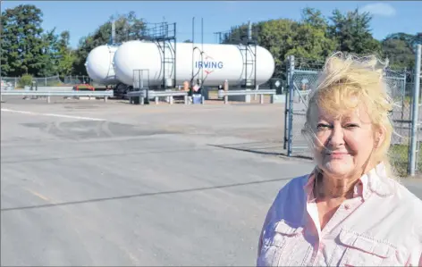  ?? DAVE STEWART/THE GUARDIAN ?? Sharon Larter is a member of a group of residents that wants to start talking again about moving the Irving Oil propane storage facility on Allen Street in Charlottet­own away from homes, schools and businesses.