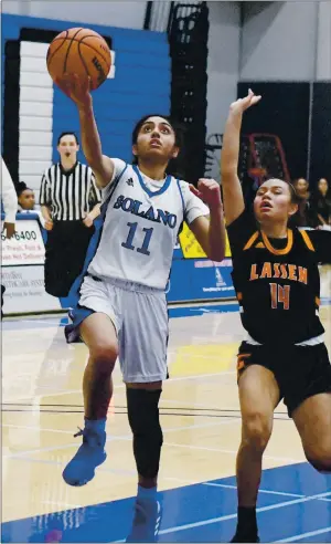  ?? CHRIS RILEY — TIMES-HERALD FILE ?? Solano College’s Ashmeen Sran goes up for a shot in a 65-73 loss to Lassen in the first round of the Solano Showdown in 2019. Sran wasn’t able to play her sophomore season at Solano.