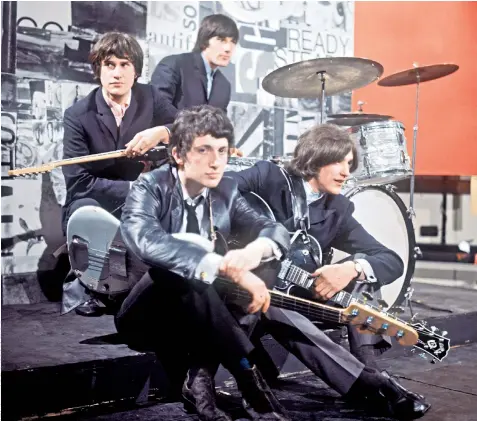  ??  ?? Fighting fit: The Kinks in their glory days in 1965, above; Sir Ray Davies in concert in 2015, below