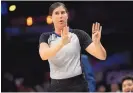  ?? NICK WASS/ASSOCIATED PRESS FILE ?? Referee Natalie Sago was one of two women assigned to the Charlotte at Orlando game on Monday, the first time in NBA history that two women worked a regular-season contest together.