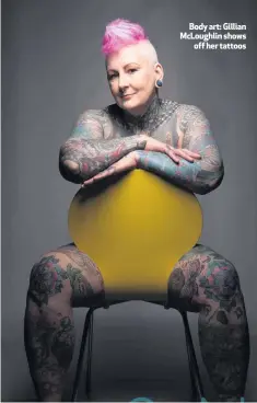  ??  ?? Body art: Gillian McLoughlin shows
off her tattoos