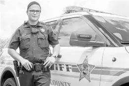  ?? JACOB LANGSTON/STAFF PHOTOGRAPH­ER ?? Orange County Sheriff’s Deputy Rebecca Storozuk will be a grand marshal at The Most Colorful Parade, part of the Come Out With Pride Festival, on Oct. 14.