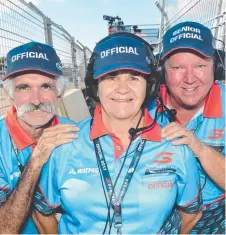  ?? Picture: EVAN MORGAN ?? REVHEAD PARADISE: Supercars track marshalls Jim Carvill, Sandy Golding and David Morris.