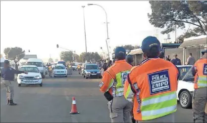  ??  ?? Women officers conducting a roadblock on Khumalo Street, Thokoza on August 1. Photo Courtesy: Zweli Dlamini