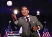  ?? MARIO TAMA — GETTY IMAGES ?? Republican Senate candidate Steve Garvey, a former baseball player, tosses a baseball at his election night party on Tuesday.