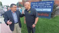  ?? MARK HOFFMAN / MILWAUKEE JOURNAL SENTINEL ?? Ald. Bob Donovan (left) speaks with fellow Ald. José G. Pérez Monday before a news conference outside Christ Evangelica­l Lutheran Church on W. Greenfield Ave. to discuss a lawsuit against the owners of a nearby home. The city is using its “bawdy house”...