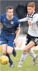  ??  ?? Eyes down Connor Malley keeps a close check on Dundee’s Cammy Kerr