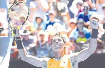  ??  ?? Spain’s Rafael Nadal celebrates his victory against Australia’s James Duckworth during their men’s singles match on day one of the Australian Open tennis tournament in Melbourne on January 14, 2019. - AFP photo