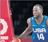  ?? CHARLIE NEIBERGALL — THE ASSOCIATED PRESS ?? The United States’ Draymond Green drives up court during a preliminar­y round game against France at the 2020 Summer Olympics on Sunday in Saitama, Japan.