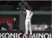  ?? D. ROSS CAMERON — THE ASSOCIATED PRESS ?? San Francisco Giants infielder Mauricio Dubon leaps in vain for a two-run home run hit by Cincinnati Reds’ Jesse Winker during the third inning Monday in San Francisco.