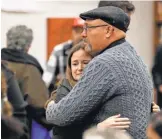  ?? ERIC GAY/ AP ?? Sutherland Springs First Baptist Church Pastor Frank Pomeroy visits with family and victims before a vigil Wednesday in Floresvill­e, Texas.